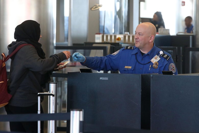 TSA employees, who are currently working without pay, screen passengers during the partial shutdown of the U.S. government, at Baltimore Washington International Thurgood Marshall Airport, on January 14, 2019 in Baltimore, Maryland.